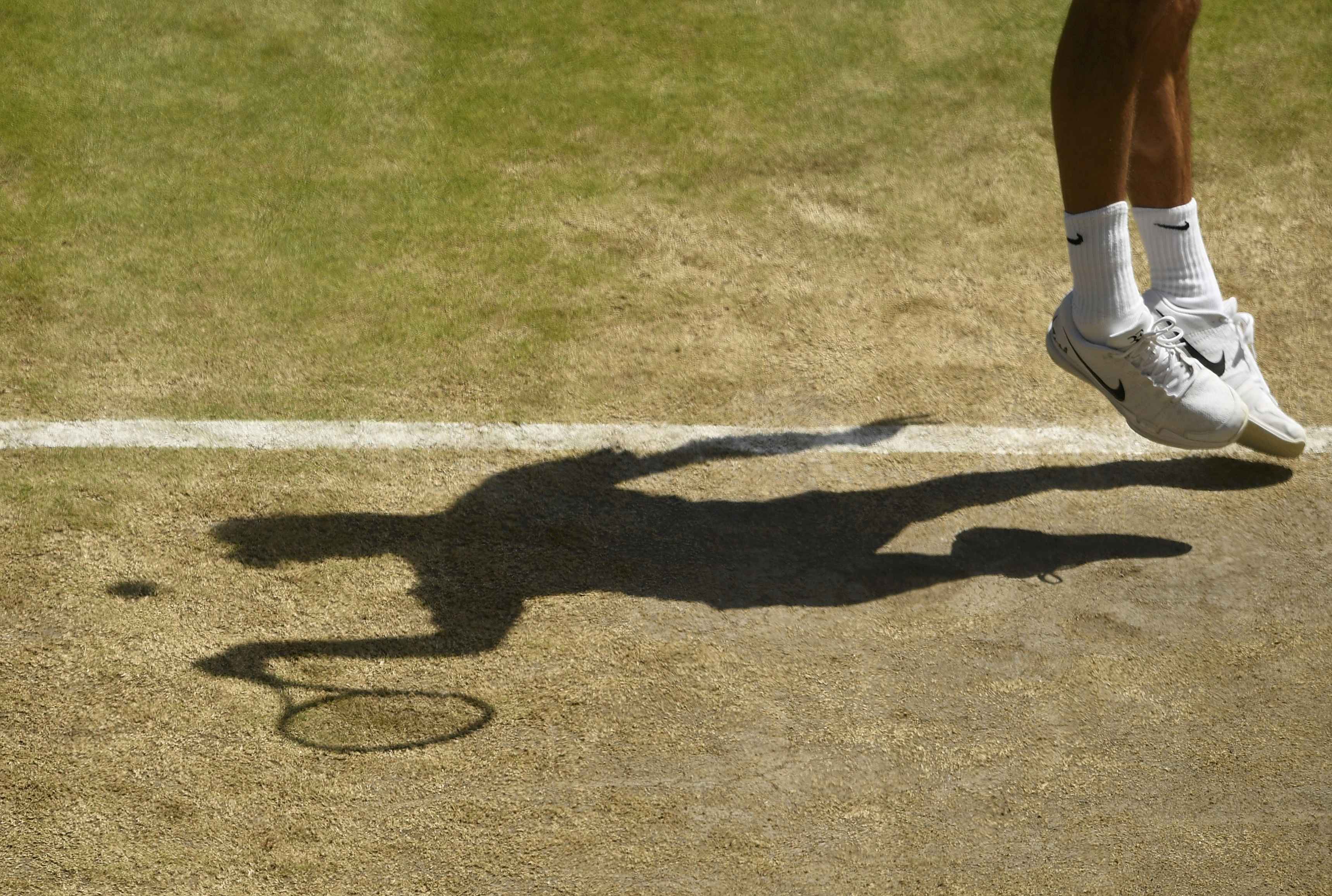 Britain Tennis - Wimbledon - All England Lawn Tennis &amp; Croquet Club, Wimbledon, England - 6/7/16 Switzerland's Roger Federer in action against Croatia's Marin Cilic REUTERS/Tony O'Brien