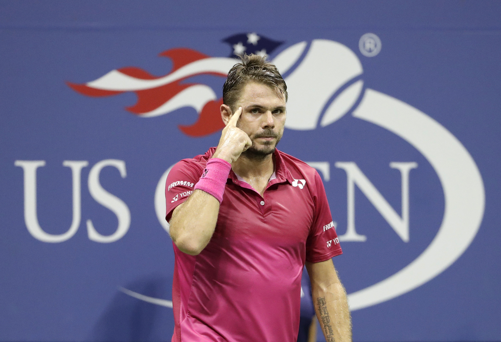 Stan Wawrinka, of Switzerland, reacts after winning the first set against Juan Martin del Potro, of Argentina, in the quarterfinals of the U.S. Open tennis tournament, Wednesday, Sept. 7, 2016, in New York. (AP Photo/Seth Wenig)