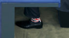 The socks of Nigel Farage, United Kingdom Independence Party (UKIP) member and Member of the European Parliament, are seen un