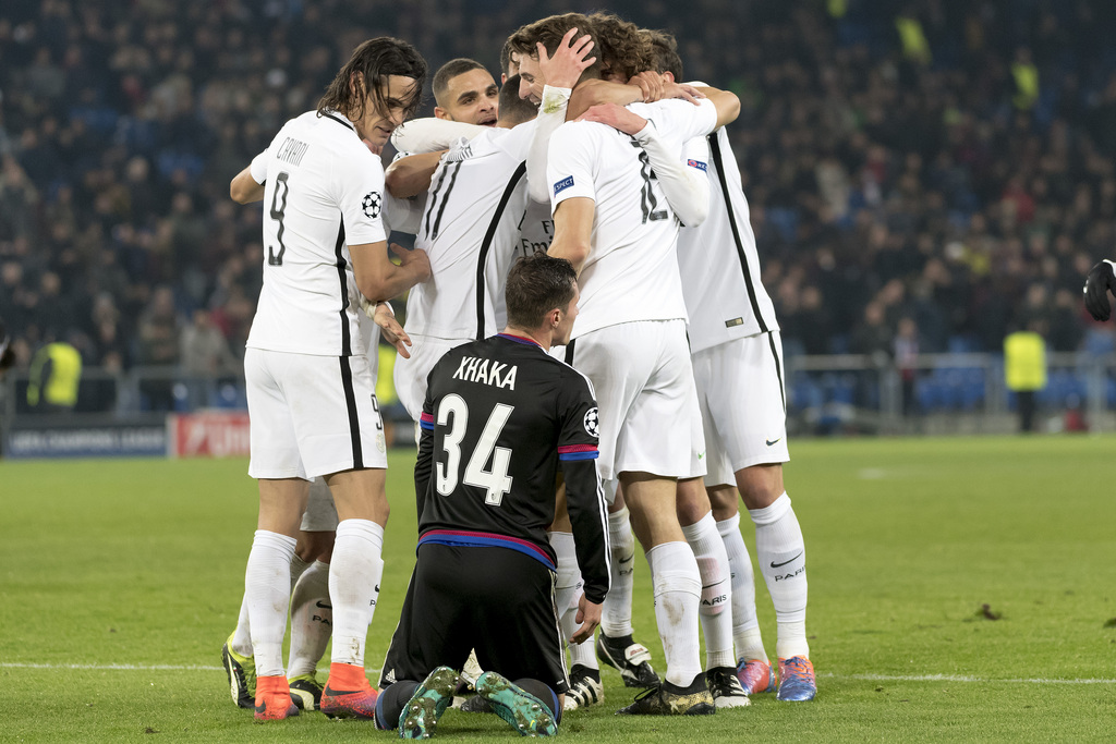 Paris' players cheer after scoring in front of Basel's Taulant Xhaka during an UEFA Champions League Group stage Group A matchday 4 soccer match between Switzerland's FC Basel 1893 and France's Paris Saint-Germain Football Club, at the St. Jakob-Park stadium in Basel, Switzerland, on Tuesday, November 1, 2016. (KEYSTONE/Georgios Kefalas)