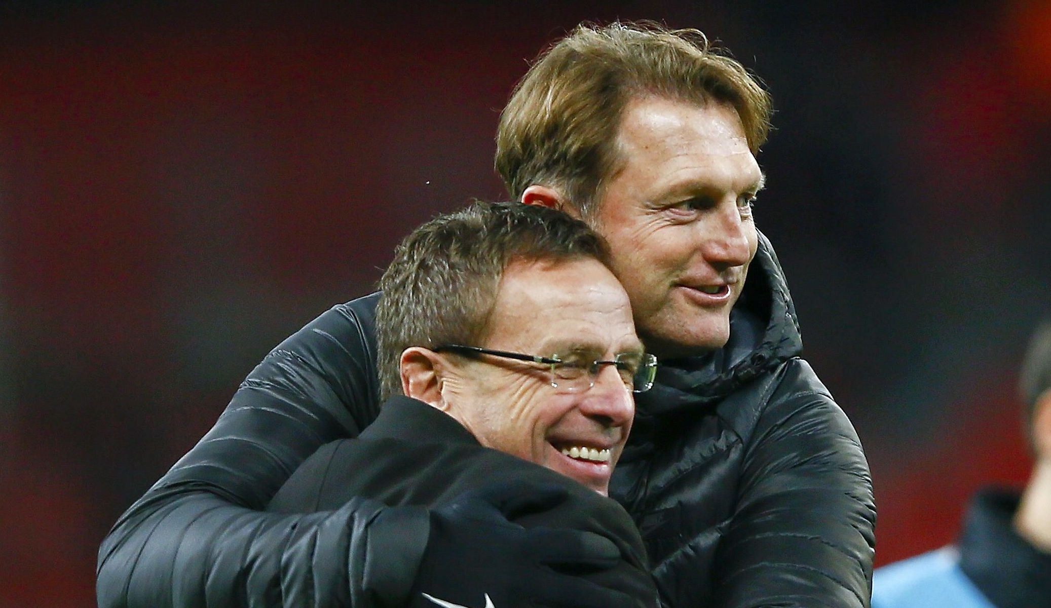 Football Soccer - Bayer Leverkusen v RB Leipzig - German Bundesliga - BayArena , Leverkusen, 18/11/16 Leipzig's coach Ralph Hasenhuettl hugs Ralf Rangnick after the match. REUTERS/Wolfgang Rattay DFL RULES TO LIMIT THE ONLINE USAGE DURING MATCH TIME TO 15 PICTURES PER GAME. IMAGE SEQUENCES TO SIMULATE VIDEO IS NOT ALLOWED AT ANY TIME. FOR FURTHER QUERIES PLEASE CONTACT DFL DIRECTLY AT + 49 69 650050