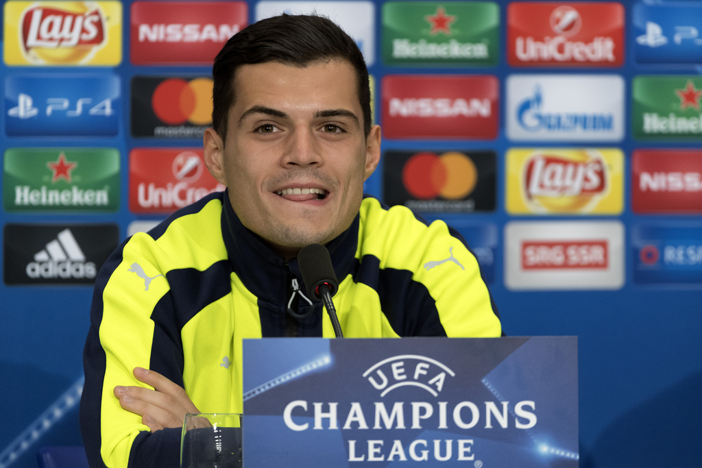 Granit Xhaka of England's Arsenal FC smiles during a press conference in the St. Jakob-Park stadium in Basel, Switzerland, on Monday, December 5, 2016. England's Arsenal FC is scheduled to play against Switzerland's FC Basel 1893 in an UEFA Champions League Group stage Group A matchday 6 soccer match on Tuesday, December 6, 2016. (KEYSTONE/Georgios Kefalas)