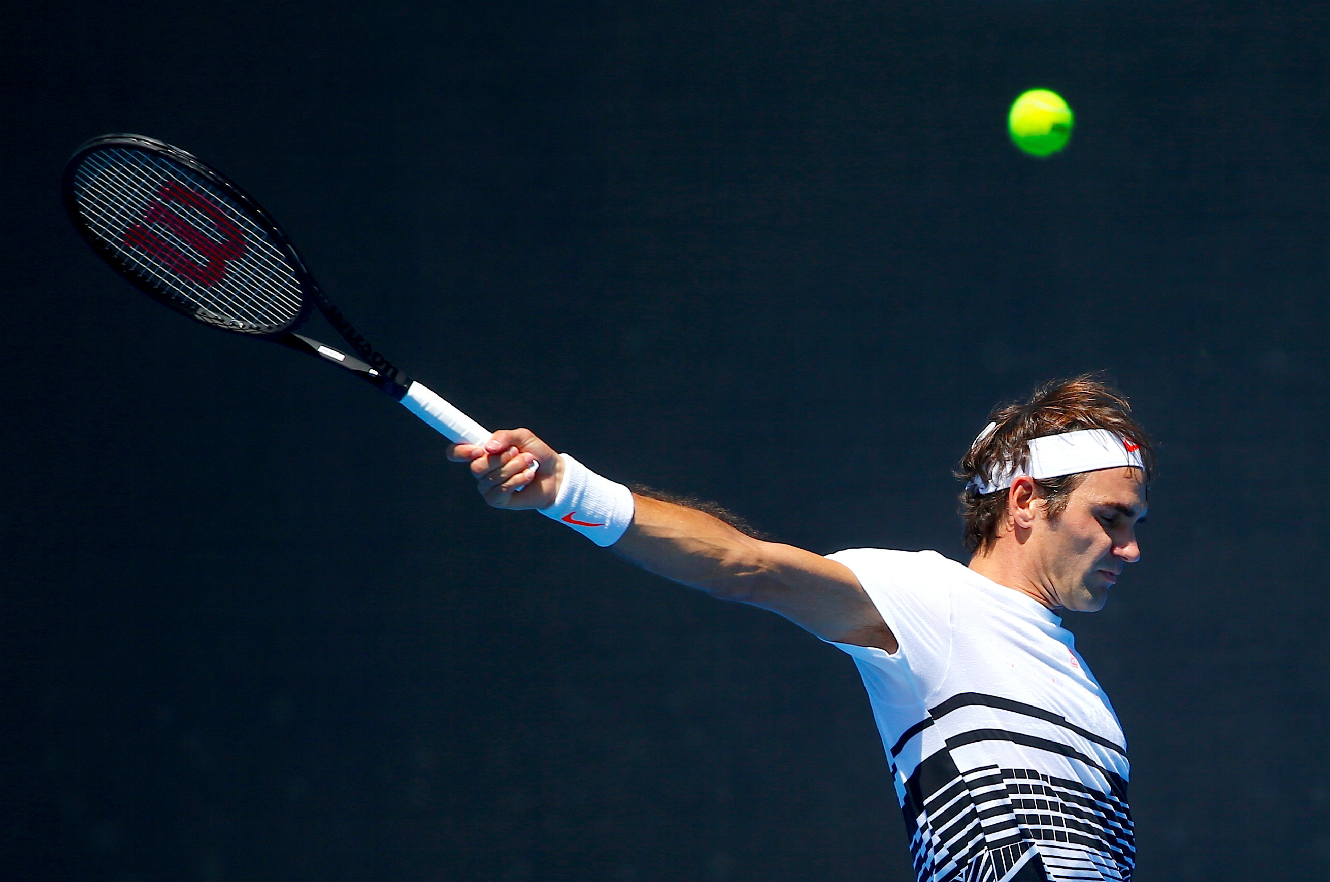 Switzerland's Roger Federer hits a shot during a training session ahead of the Australian Open tennis tournament in Melbourne, Australia, January 12, 2017. REUTERS/David Gray