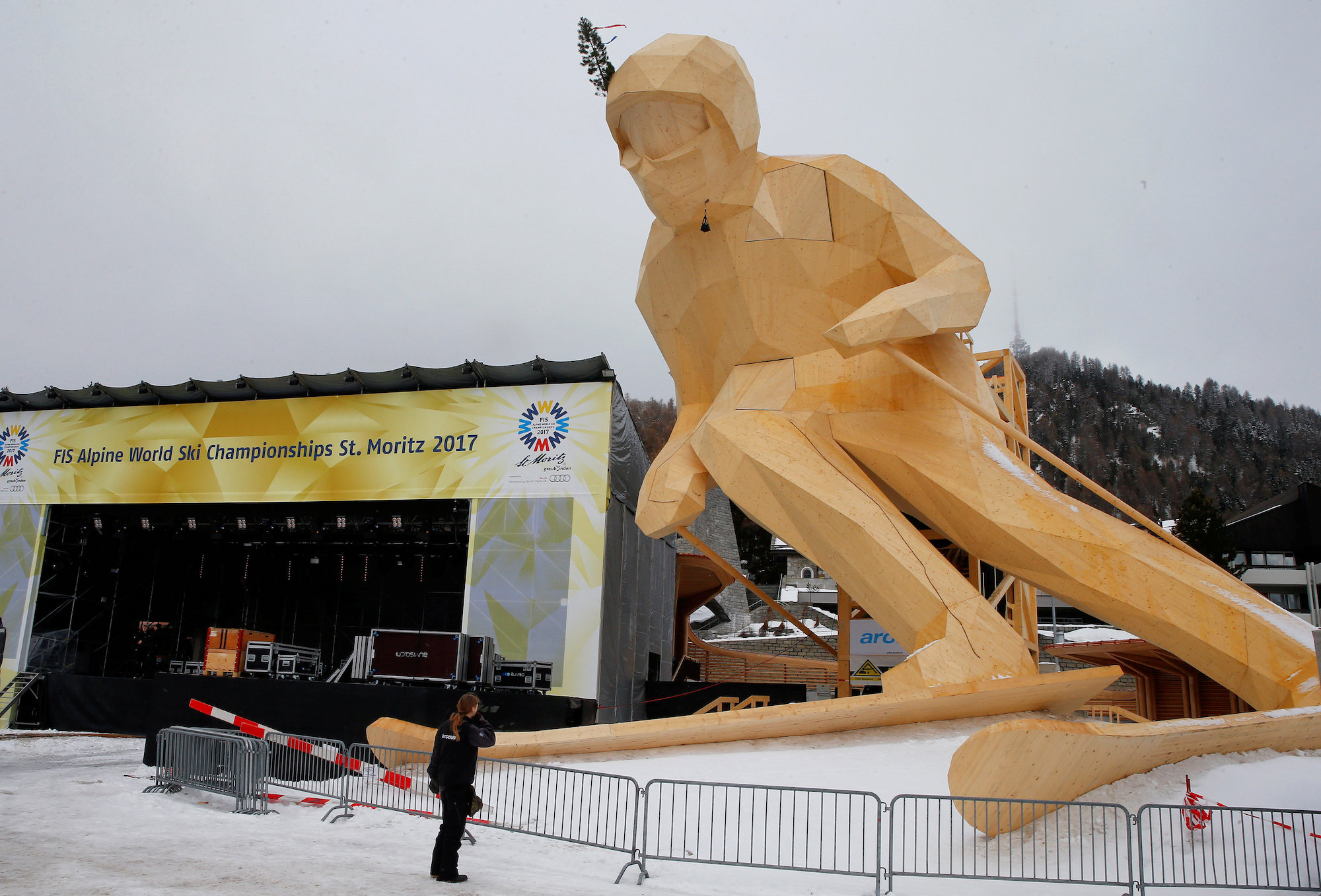 A giant wooden sculpture of a ski racer is placed beside the stage for the medal ceremonies of the upcoming FIS Alpine World Ski Championships 2017 in the mountain resort of St. Moritz, Switzerland February 2, 2017. REUTERS/Arnd Wiegmann