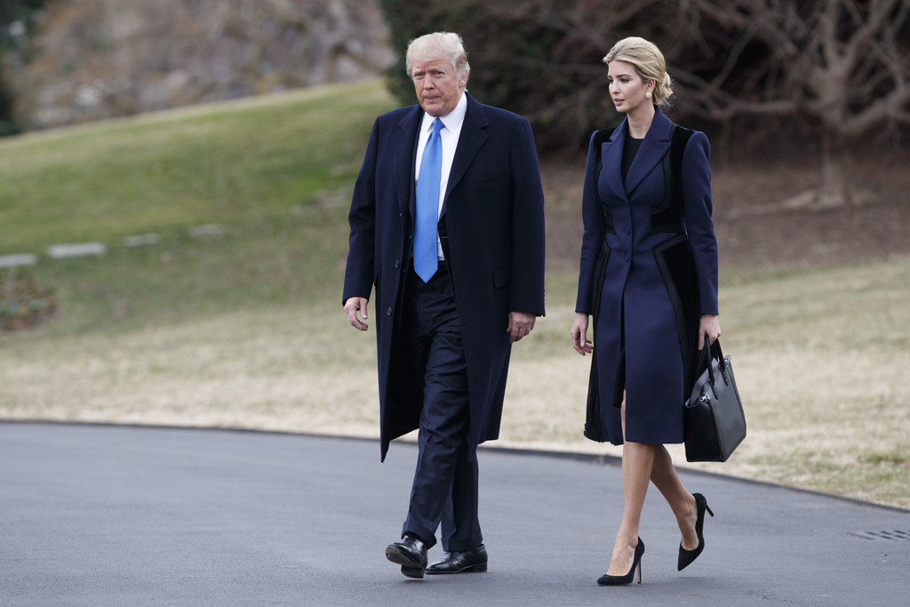 FILE - In this Feb. 1, 2017 file photo, President Donald Trump and his daughter Ivanka Trump walk to board Marine One on the South Lawn of the White House in Washington. Ivanka Trump is working out of a West Wing office and will get access to classified information, though she is not technically serving as a government employee, according to an attorney for the first daughter. (AP Photo/Evan Vucci, File)