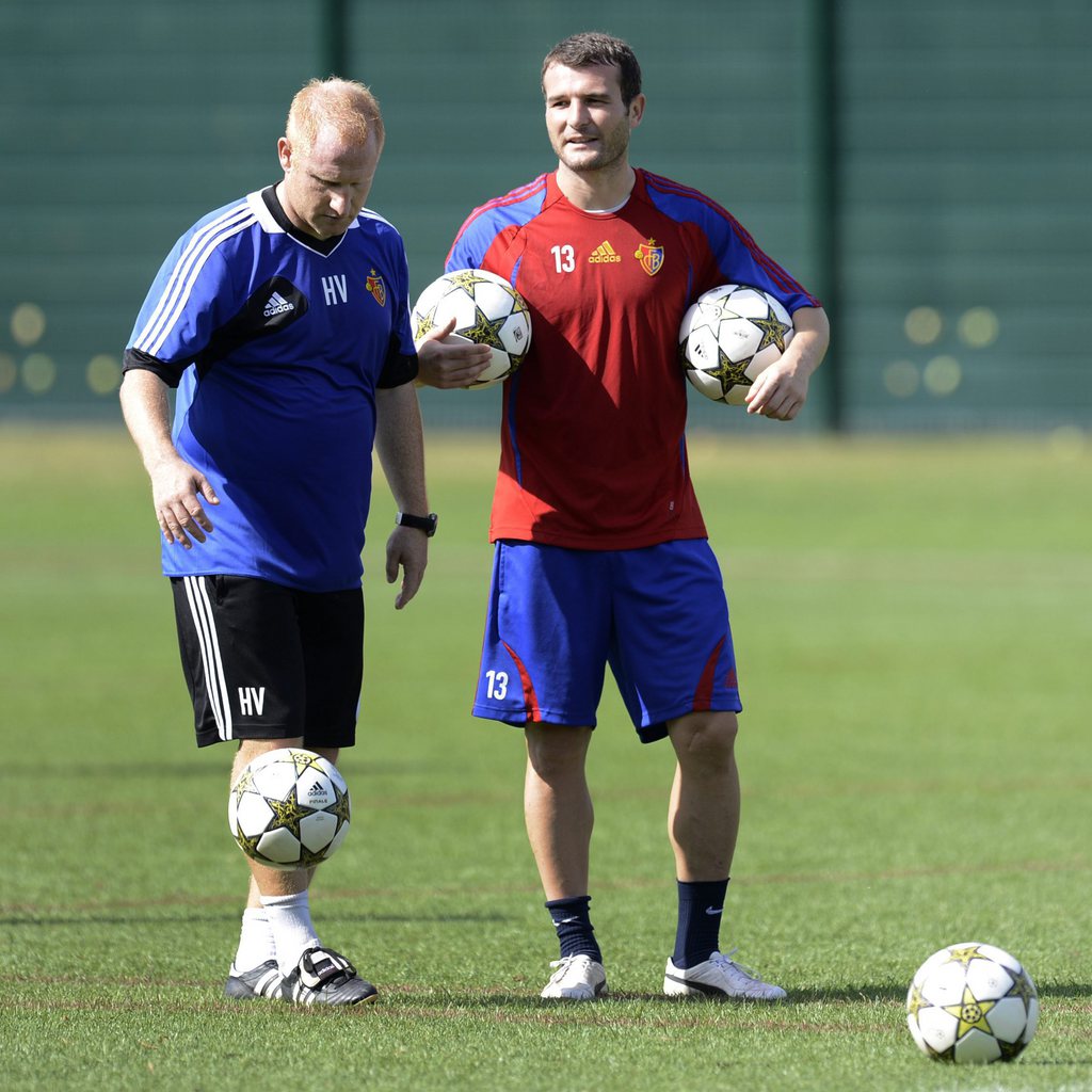 Head coach Heiko Vogel, left, and Alex Frei, right, of Switzerland's soccer team FC Basel 1893, during a training session in the St. Jakob-Park stadium in Basel, Switzerland, on Monday, August 20, 2012. Switzerland's FC Basel 1893 is scheduled to play aga