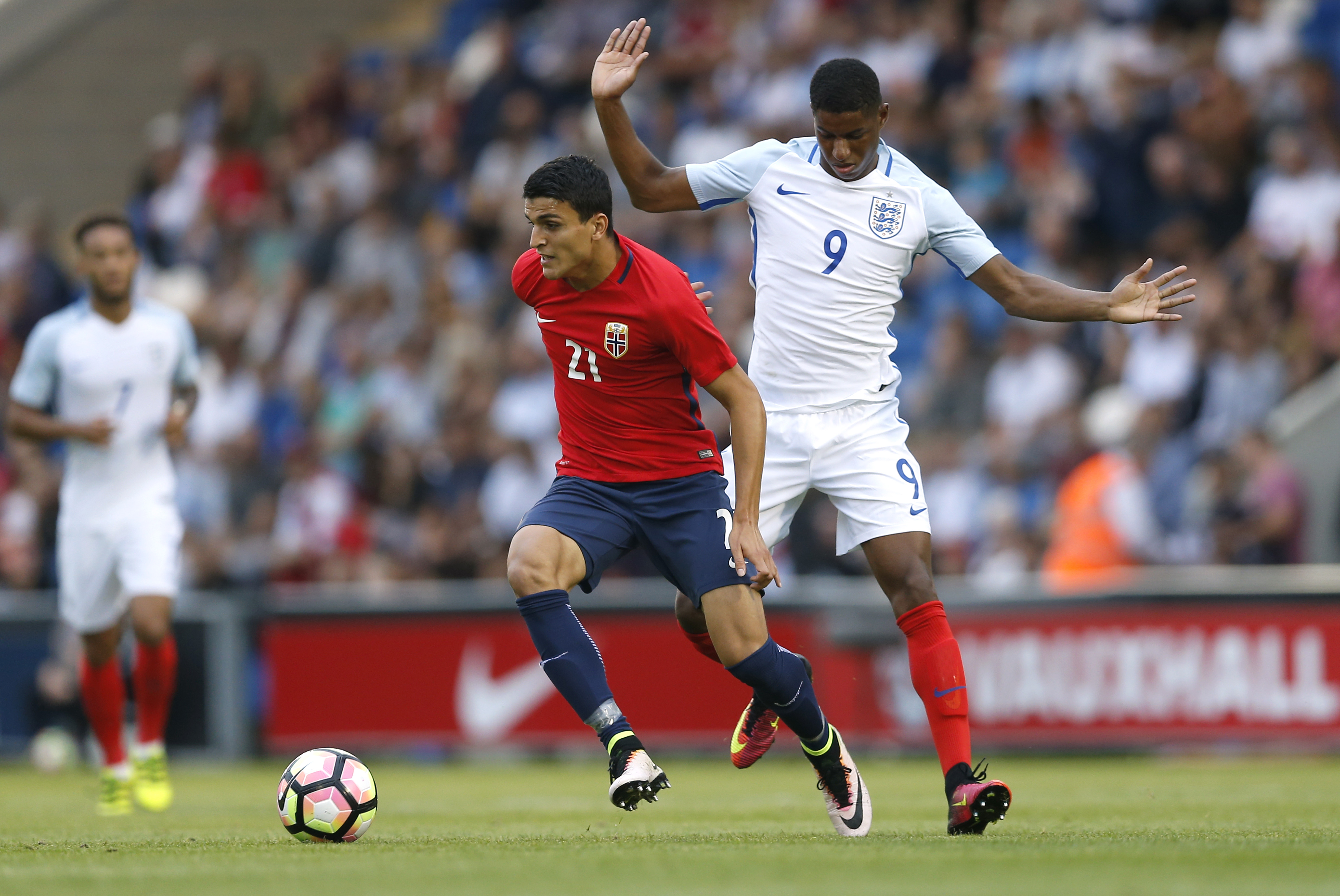Britain Football Soccer - England v Norway - UEFA European Under 21 Championship Qualifying Group Nine - Weston Homes Community Stadium - 6/9/16 England's Marcus Rashford in action with Norway's Mohamed Elyounoussi Action Images via Reuters / Matthew Childs Livepic EDITORIAL USE ONLY.