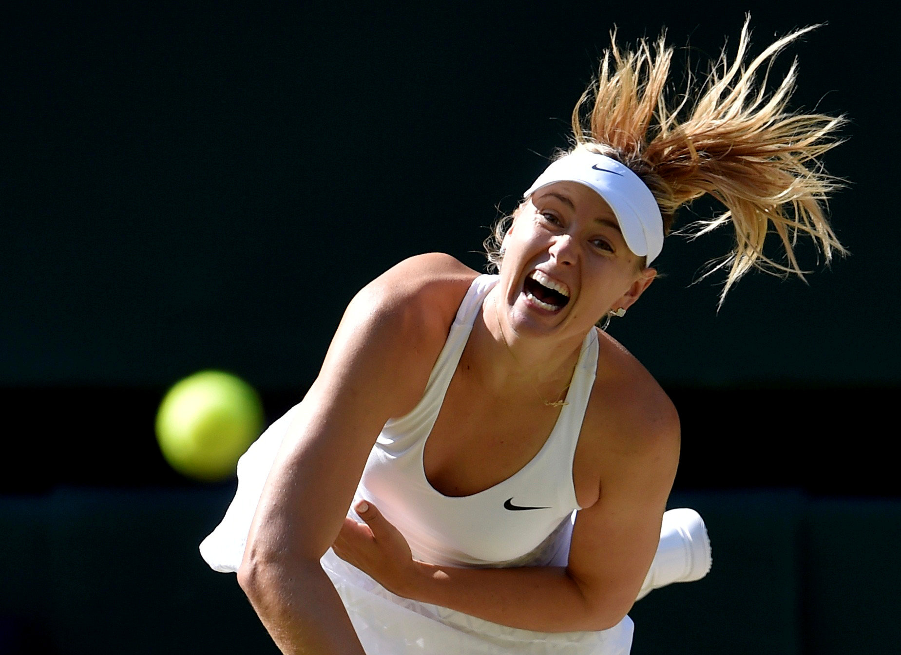 FILE PHOTO: Maria Sharapova of Russia serves during her match against Serena Williams of the U.S.A. at the Wimbledon Tennis Championships in London, July 9, 2015. REUTERS/Toby Melville/File Photo