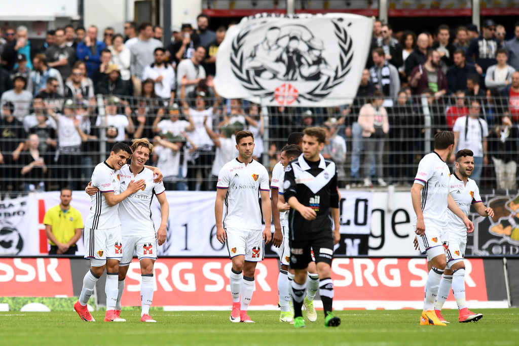Basel's player Alexander Fransson, left, celebrates with team mates the 0-1 goal during the Super League soccer match FC Lugano against FC Basel, at the Cornaredo stadium in Lugano, Sunday, May 7, 2017. (KEYSTONE/Ti-Press/Gabriele Putzu)