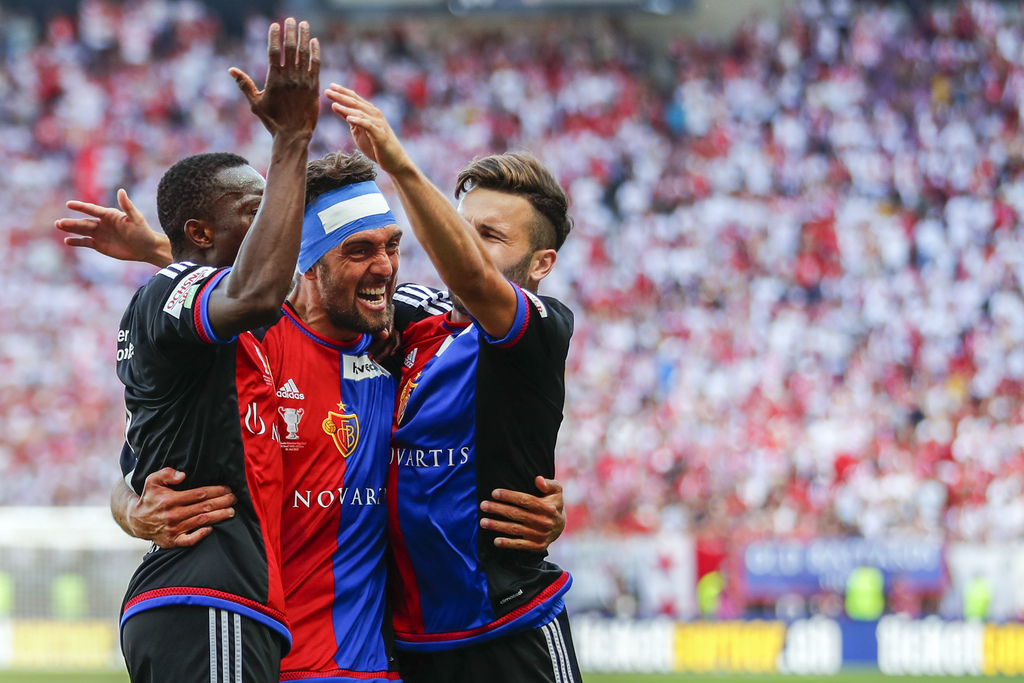 Basel's Adama Traore of Ivory Coast, Matias Delgado of Argentina, and Renato Steffen, from left, celebrate after Traore's goal to 2:0 during the Swiss Cup final soccer match between FC Basel 1893 and FC Sion at the stade de Geneve stadium, in Geneva, Switzerland, Thursday, May 25, 2017. (KEYSTONE/Valentin Flauraud)