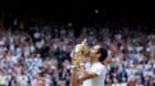 Tennis - Wimbledon - London, Britain - July 16, 2017   Switzerland’s Roger Federer poses with the trophy as he celebrates w