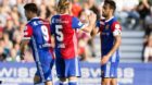 Basel's Matias Delgado, right, celebrates his goal after scoring (1-1) with Basel's Michael Lang, middle, and Basel's Ricky V