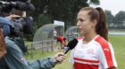 Switzerland's midfielder Lia Waelti speaks to a TV reporter, after a training session of the national soccer team of Switzerl