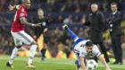 BaselÕs Blas Riveros, right, fights for the ball against Manchester United's Ashley Young, during the UEFA Champions League 