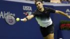 epa06184316 Roger Federer of Switzerland hits a return to Philipp Kohlschreiber of Germany on the eighth day of the US Open T