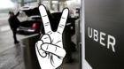 FILE - In this March 15, 2017, file photo, a sign marks a pick up point for the Uber car service at LaGuardia Airport in New 