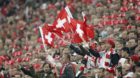 Switzerland's fans cheer during the Euro 2012 group G qualification soccer match between Switzerland and England at the St. J