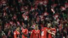 Switzerland's players celebrate their qualifying for the 2018 FIFA World Cup Russia after beating Northern Ireland, during th