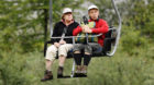 EXCLUSIVE PICTURES Angela Merkel and her husband Joachim Sauer are seen on a chair lift during their holidays on July 30, 201
